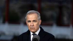 epa12652940 Canadian Prime Minister Mark Carney speaks during a press conference in Beijing, China, 16 January 2026. Carney is visiting Beijing from 14 to 17 January and met with Chinese President Xi Jinping earlier in the day.  EPA/JESSICA LEE
