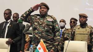 epa11462682 Head of the military junta in Niger General Abdourahamane Tchiani (C) salutes at the start of the first ever Alliance of Sahel States summit in Niamey, Niger, 06 July 2024. The junta-leaders in Mali, Burkina Faso, and Niger held their first ever joint summit of a new regional bloc, the Alliance of Sahel States, AES, since seizing power in a series of coups.  EPA/ISSIFOU DJIBO