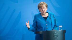 epa09185412 German Chancellor Angela Merkel speaks to the media following a virtual meeting of the European Council and an EU summit with India during the coronavirus pandemic in Berlin, Germany, 08 May 2021. Central to the meetings, which included India's Prime Minister Narendra Modi, were the resumption of free trade talks with India.  EPA/STEFFI LOOS / POOL