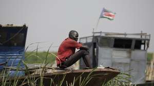 epa10629414 A South Sudanese man looks on as he sits on a boat on the Nile river at the fluvial port of Renk, in the Upper Nile State town of Renk, South Sudan, 14 May 2023 (issued 15 May 2023). According to Mohajer Mhadi Khalifa, head of the boats union in charge of regulating the transport on the Nile in Renk, five boats are planned to transport the returnees to their areas of origin on the Nile towards the Southern Town of Malakal and other locations. On 14 May 2023 a group of 348 people embarked for the trip, following 577 others who made the same trip the previous day after days of waiting in the fluvial port of Renk. The transport was coordinated and organized by the IOM, Caritas and the RCC (the South Sudanese Relief and Rehabilitation Commission). According to the United Nations, some 200,000 people have fled the conflict in Sudan between 15 April and 12 May 2023. Most of them left towards neighboring countries such as Egypt, Tchad, South Sudan or Ethiopia, and about two million people were internally displaced. Leaving behind them the armed conflict between the Sudanese military and the RSF (Rapid Support Forces) militia, most of the refugees in South Sudan are South Sudanese returnees, part of the some 800,000 who had previously fled the war in South Sudan and who are now returning to a country which is barely out of conflict itself with tensions still remaining in many areas.  EPA/AMEL PAIN ATTENTION: This Image is part of a PHOTO SET