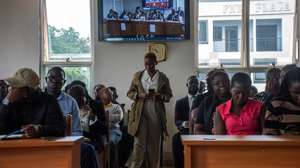 epa11256775 Ugandan LGBTQ+ activists and community members listen to proceedings at the Constitutional Court in Kampala, Uganda, 03 April 2024. The Uganda Constitutional Court has upheld the Anti-Homosexuality law after an appeal by LGBTQ+ members and lawyers. The law, passed in March 2023, imposes the death sentence and life imprisonment for certain homosexual acts.  EPA/ISAAC KASAMANI