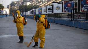 epa05127225 Local workers disinfect the famous Sambadrome in Rio de Janeiro, Brazil, 26 January 2016, ahead of the beginning of Rio's Carnival parades, on next 05 February, to fight against the mosquito Aedes aegypti, which spreads the Zika, Dengue and Chikunguna viruses. The carnival stadium Sambadrome will host the archery events during the Summer Olympic Games Rio 2016.  EPA/MARECELO SAYAO