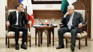 epa10936748 French President Emmanuel Macron (L) and Palestinian President Mahmoud Abbas (R) attend a meeting in the West Bank city of Ramallah, 24 October 2023. French President Macron said the 07 October attack by Hamas was 'a tragedy' for the Israeli people and 'also a catastrophe' for the Palestinians at a meeting with Palestinian President Abbas in Ramallah.  EPA/CHRISTOPHE ENA / POOL MAXPPP OUT