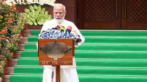 epa11433874 Indian Prime Minister Narendra Modi  addresses the media upon arrival for the first session of the new Indian Parliament at the new Parliament House building in New Delhi, India, 24 June 2024. The inaugural session of India's new parliament that runs until July 3, marks a significant milestone for Prime Minister Modi as he assumes leadership of a coalition government for the first time in over a decade.  EPA/HARISH TYAGI