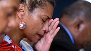 epa10371287 People's Alliance Party elected member of parliament Lynda Tabuya wipes away tears as leader Sitiveni Rabuka speaks at a church service at the Fijian Teachers Association Hall in Suva, Fiji, 18 December 2022. According to the Fiji Elections Office, the People's Alliance Party won 21 parliamentary seats in the election.  EPA/MICK TSIKAS AUSTRALIA AND NEW ZEALAND OUT