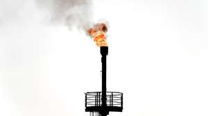 epa09850065 Combustible exhaust gases are flared with a gas flare on an oil field near the German-Durch border in Emlichheim, Germany, 22 March 2022 (issued 25 March 2022). The Russian invasion of Ukraine has led many governments besides Germany aiming at becoming less dependent on Russian oil and gas imports.  EPA/SASCHA STEINBACH