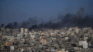 epa10915048 Smoke rises from the Gaza port following an Israeli air strike, in Gaza City, 12 October 2023. More than 1,400 Palestinians have been killed and over 6,000 others injured, according to the Palestinian Ministry of Health, after Israel started bombing the Palestinian enclave in response to attacks carried out by the Islamist movement Hamas on Israel from the Gaza Strip on 07 October. More than 4,000 people, including 1,500 militants from Hamas, have been killed and thousands injured in Gaza and Israel since 07 October, according to Israeli military sources and Palestinian officials.  EPA/MOHAMMED SABER