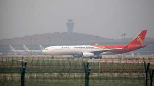 epa10800915 A passenger airplane lands in Beijing Captial International Airport in Beijing, China, 15 August 2023. The Biden administration announced on August 11 that the US and China will authorise twice the number of passenger flights permitted for air carriers to travel between the two nations.  EPA/WU HAO