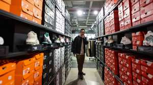 epa11252491 A man looks at commodities in a shopping mall in Beijing, China, 31 March 2024. China&#039;s official manufacturing purchasing managers Index (PMI) increased to 50.8 percent in March from 49.1 from the previous month. Output increased following a fall in the prior month, and new orders rose for the first time since September 2023, with the growth rate being the fastest in a year, according to data released by the National Bureau of Statistics (NBS) on 31 March 2024.  EPA/WU HAO