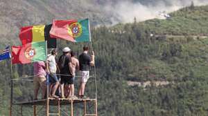 Rally fans watch competitors pass during the Rally Portugal 2024 as part of the World Rally Championship (WRC) in Arganil, Portugal, 10 May 2024. PAULO NOVAIS/LUSA