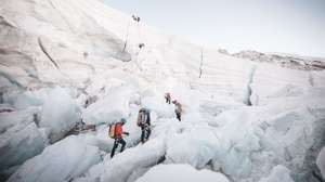 epa11334454 A handout photo made available by Seven Summit Trek shows climbers on a glacier at a base camp, 5,364 m (17,598 ft) above sea level, of Mt. Everest in Nepal, 26 April 2024 (issued 12 May 2024). According to Seven Summit Trek, Nepalese climber Kami Rita Sherpa broke his own record on 12 May 2024 after successfully climbing Mt Everest for the 29th time.  EPA/SEVEN SUMMIT TREK / HANDOUT  HANDOUT EDITORIAL USE ONLY/NO SALES HANDOUT EDITORIAL USE ONLY/NO SALES