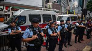 epa11389365 Police officers stand guard at Causeway Bay near Victoria Park in Hong Kong, China, 04 June 2024. For almost three decades, people in Hong Kong commemorated the 04 June anniversary of China&#039;s deadly crackdown on protesters in Tiananmen Square with a noisy candlelit vigil in the city&#039;s Victoria Park. The subject has become so sensitive that a remembrance of the crackdown at Tiananmen Square, which had previously been held in nearby Victoria Park, has no longer taken place since the new national security law came into effect.  EPA/LEUNG MAN HEI