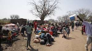 epa10629418 South Sudanese stay in the vicinity of the fluvial port of Renk as they wait to be transported south, in the Upper Nile State town of Renk, South Sudan, 14 May 2023 (issued 15 May 2023). According to Mohajer Mhadi Khalifa, head of the boats union in charge of regulating the transport on the Nile in Renk, five boats are planned to transport the returnees to their areas of origin on the Nile towards the Southern Town of Malakal and other locations. On 14 May 2023 a group of 348 people embarked for the trip, following 577 others who made the same trip the previous day after days of waiting in the fluvial port of Renk. The transport was coordinated and organized by the IOM, Caritas and the RCC (the South Sudanese Relief and Rehabilitation Commission). According to the United Nations, some 200,000 people have fled the conflict in Sudan between 15 April and 12 May 2023. Most of them left towards neighboring countries such as Egypt, Tchad, South Sudan or Ethiopia, and about two million people were internally displaced. Leaving behind them the armed conflict between the Sudanese military and the RSF (Rapid Support Forces) militia, most of the refugees in South Sudan are South Sudanese returnees, part of the some 800,000 who had previously fled the war in South Sudan and who are now returning to a country which is barely out of conflict itself with tensions still remaining in many areas.  EPA/AMEL PAIN ATTENTION: This Image is part of a PHOTO SET