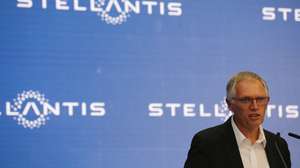 epa11491693 Carlos Tavares, CEO of Stellantis, delivers a speech at the Stellantis manufacturing plant in Kragujevac, Serbia, 22 July 2024. The new Fiat Grande Panda is the first model of the new global line-up based on a multi-energy platform, according to a press statement, with serial production expected in two months. Stellantis inaugurated the new electric car production lines at its Serbian plant in Kragujevac. This initiative is part of a 190 million euro investment by Stellantis and Serbia to produce electric vehicles, with the Grande Panda set to be available in electric and hybrid versions.  EPA/ANDREJ CUKIC