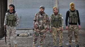 epa11805851 Syrian opposition fighters secure the area near Manbij city, northern Syria, 04 January 2025. A group of opposition fighters from the National Army gathered near Manbij to launch a military operation against the positions of the Syrian Democratic Forces (SDF) in Tishreen Dam near the city of Manbij in northern Syria.  EPA/BILAL AL HAMMOUD