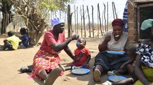 epa11538015 A woman serves a nutritious porridge called 'maworese' made with locally available ingredients in Mudzi District, eastern Zimbabwe, 08 August 2024. The government, with support from UNICEF Zimbabwe, conducted a joint nutrition support and monitoring visit in Mudzi District to curb malnutrition cases. Approximately 580,000 children in Zimbabwe are affected by malnutrition, and this number may escalate due to an ongoing drought exacerbated by El Nino, according to UNICEF. The Ministry of Health and Child Care and UNICEF have launched two key initiatives, school feeding programs, and community-based feeding programs, aiming at providing nutritious meals to children.  EPA/MUNASHE CHOKODZA