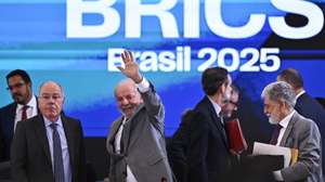 epa11926040 Brazilian President Luiz Inacio Lula da Silva (C), greetsnext to the Minister of Foreign Affairs of Brazil, Mauro Vieira (L), at the end of the first meeting of sherpas (chief negotiators) of the Brazilian presidency of the BRICS, at the Itamaraty Palace in Brasilia, Brazil, 26 February 2025. The meeting takes place from 25 to 26 February.  EPA/Andre Borges