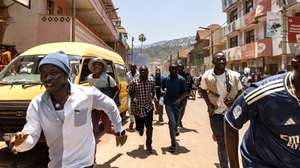 epa11928093 People run away from the site of a bomb blast in Bukavu, South Kivu province, Democratic Republic of Congo, 27 February 2025. Explosions occurred during a rally held by the M23 armed group attended by hundreds of people, almost two weeks after M23 seized control of Bukavu, the region’s second largest city.  EPA/YEONGSHIN MUBAWA