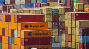epa12022794 Shipping containers are stacked at the Duisport in Duisburg, Germany, 10 April 2025. US President Trump on 09 April has paused for 90 days the implementation of higher tariffs announced on 02 April for most countries, except China whose tariff has increased to 125 percent.  EPA/CHRISTOPHER NEUNDORF