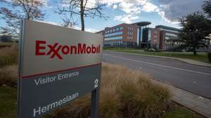 epa03449042 The ExonMobil logo in front of the ExonMobil building in Machelen, Belgium, 27 October 2012. The British oil executive Nicholas Mockford was shot dead on 14 October 2012, outside a restaurant in Brussels earlier this month, the Foreign Office in London said 26 October 2012. British media reports named the victim as Nicholas Mockford, 60, who worked for Exxon Mobil. He was reported to have been attacked as he left a restaurant with his wife in a suburb of the Belgian capital on 14 October. The story emerged only now because of a news blackout in Belgium, media reports said.  EPA/JULIEN WARNAND