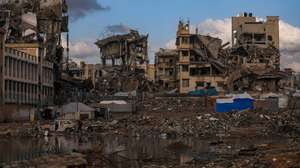 epaselect epa12547938 The tents of Palestinian families surrounded by destroyed buildings during a rainy day in Gaza City, Gaza Strip, 25 November 2025. Around 1.9 million people in Gaza, nearly 90 percent of the population, have been displaced since the Israel-Hamas conflict began in October 2023, according to the UN.  EPA/MOHAMMED SABER