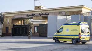 epa12696715 An ambulance waits on the Egyptian side of the Rafah Border Crossing, between Egypt and the Gaza Strip, in Rafah, North Sinai Governorate, Egypt, 01 February 2026. The crossing was opened on a trial basis on 01 February morning to facilitate the entry of essential supplies and ambulances. An official reopening is scheduled for 02 February, marking a critical step in the delivery of international relief following the cessation of major hostilities.  EPA/STRINGER