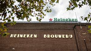 epa12453292 An exterior view of the former Heineken brewery, now the Heineken Experience in Amsterdam, The Netherlands, 14 October 2025. The brewer is reorganizing its headquarters, which will affect approximately four hundred jobs.  EPA/RAMON VAN FLYMEN