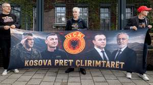 epa13243201 Supporters of former Kosovar President Hashim Thaci stand outside the Kosovo Tribunal, where a verdict is being delivered in the trial of Thaci and three former leaders of the Kosovo Liberation Army (UCK), in The Hague, Netherlands, 16 September 2026. Thaci, on trial at the Kosovo Specialist Chambers in The Hague on charges of war crimes and crimes against humanity allegedly committed during the 1998-1999 Kosovo War, is due to receive a verdict on 16 September 2026.  EPA/RAMON VAN FLYMEN