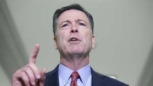 epa07237747 Former FBI Director James Comey delivers remarks to members of the news media after finishing his testimony before members of the House Judiciary and House Oversight and Government Reform Committees, on Capitol Hill in Washington, DC, USA, 18 December 2018. The two House panels are investigating the handling by federal law enforcement of probes into Hillary Clinton's emails and possible ties between Russia and the 2016 Trump presidential campaign.  EPA/MICHAEL REYNOLDS