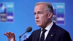 epa13096934 Canadian Prime Minister Mark Carney speaks to the media upon his arrival at the 2026 NATO Summit in Ankara, Turkey, 08 July 2026. The NATO Summit takes place from 07-08 July.  EPA/NECATI SAVAS