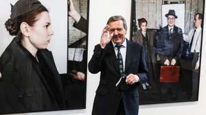 epa09254821 Former German Chancellor Gerhard Schroder greets photographers as he visits the exhibition 'Diversity United' at the former Tempelhof airport, in Berlin, Germany, 08 June 2021. The exhibition, which is a joint project of the Bonn Foundation for Art and Culture and the renowned Tretyakov Gallery in Moscow 'shows the vitality and diversity of the contemporary European art scene after the fall of the Iron Curtain until today and underlines the importance of intercultural dialogue in times of political uncertainties' as it is described in the exhibition's press release.  Works of 90 artists from 34 countries,  showcasing the 'diversity and vitality of the contemporary European art scene' can be seen from 09 June to 19 September in two hangars of the former inner-city airport.  EPA/FILIP SINGER