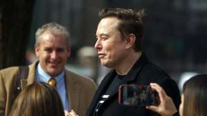 epa11893568 US entrepreneur and US special government employee Elon Musk (R) leaves Blair House close to the White House, in Washington, DC, USA, 13 February 2025.  EPA/WILL OLIVER