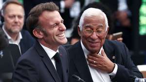 epa12508627 French President Emmanuel Macron (L) laughs with European Council President Antonio Costa (R) during the launch of the Tropical Forest Forever Fund (TFFF) at the COP30 leaders' summit in Belem, Brazil, 06 November 2025. On the first day of the COP30 leaders' summit, Brazilian President Luiz Inacio Lula da Silva launched an international fund that seeks to make forest conservation a global financial strategy.  EPA/ANDRE COELHO