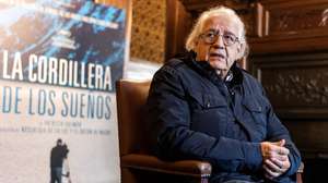 epa09646608 Chilean filmaker Patricio Guzman poses for the media during the presentation of his last documentary film 'The Cordillera of Dreams' in Madrid, Spain on 17 December 2021.  Guzman's film was awarded the Best Documentary film during the last Cannes Festival.  EPA/Rodrigo Jimenez