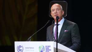 epa09558952 Jeff Bezos, founder and executive chairman of Amazon, addresses the Action on Forests and Land Use session at the UN Climate Change Conference (COP26) in Glasgow, Britain, 02 November 2021.  EPA/ROBERT PERRY