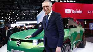 epa11658128 CEO of Stellantis Carlos Tavares poses next to the C5 Aircross Concept Citroen car during the Mondial de l'Auto – Paris Motor Show 2024 in Paris, France, 14 October 2024. The 2024 Paris Motor Show showcases hundreds of vehicles from 14 to 20 October 2024.  EPA/YOAN VALAT