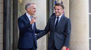 epa13033269 French President Emmanuel Macron (R) welcomes Canadian Prime Minister Mark Carney (L) upon his arrival at the Elysee Palace in Paris, France, 12 June 2026.  EPA/CHRISTOPHE PETIT TESSON