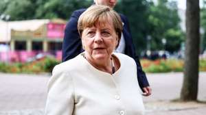 epa11362294 Former German Chancellor Angela Merkel arrives to attend an ecumenical service in St. Mary's Church on the occasion of the 75th anniversary of the proclamation of the Basic Law, in Berlin, German, 23 May 2024. Germany marks the 75th anniversary of its Constitution. The Federal Republic of Germany was founded with the signing of the Basic Law in May 1949.  EPA/Filip Singer