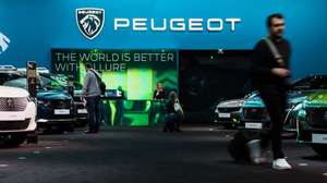 epa10403153 The Peugeot stand during the inauguration of the Brussels Motor Show 2023, in Brussels, Belgium, 13 January 2023. The 100th edition of the Autosalon at the Brussels Expo will run from 14 to 22 January 2023.  EPA/STEPHANIE LECOCQ
