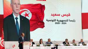 epa11648050 Farouk Bouasker (L), president of the High Independent Authority for Elections (ISIE), gives a press conference to announce the results of the presidential election in Tunis, Tunisia, 07 October 2024. Bouasker announced that 2,808,548 voters went to the polls on 06 October for a turnout of 28.8%. Incumbent President Kais Saied came in first place with a score of 90.69%, or 2,438,954 of the votes. He is followed by Ayachi Zammel with a rate of 7.35% (197,551) then Zouhaier Maghzaoui with a rate of 1.97% (52,935 votes).  EPA/MOHAMED MESSARA