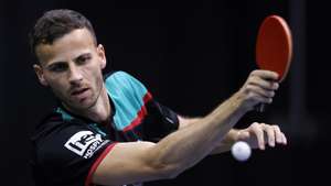 epa10129162 Tiago Apolonia of Portugal competes  against Patrick Franziska of Germany during their table tennis Men's Singles Round of 16 at the European Championships Munich 2022, in Munich, Germany, 19 August 2022.  EPA/RONALD WITTEK