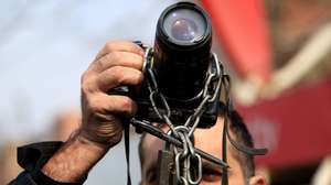 epa11867605 A Pakistani journalist holds his camera during a protest rally against the amendments of the Prevention of Electronic Crimes Act (PECA), in Peshawar, Pakistan, 01 February 2025. The PECA amendments, passed by the National Assembly on 23 January, makes changes to the country's cybercrime laws that would criminalize 'fake news' on social media platforms and have been criticized for potentially restricting press freedom.  EPA/BILAWAL ARBAB