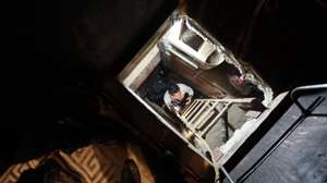 epa04695093 Policemen inspect a tunnel found in a house in Tijuana, Mexico, 07 April 2015. Mexican soldiers and federal agents found this underground tunnel close to the border line with the United States. Nine people were arrested.  EPA/Lauro Serna