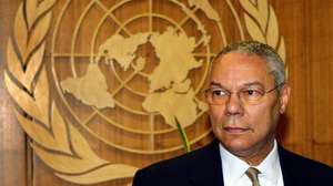 epa09530044 (FILE) - US Secretary of State Colin Powell waits for United Nations Secretary General Kofi Annan outside Annan&#039;s office, at the UN Headquarters in New York City, USA, 21 August 2003 (reissued 18 October 2021). Colin Powell has died at the age of 84, his family said on Facebook on 18 October 2021.  EPA/MATT CAMPBELL