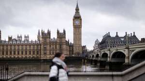 epa11809349 A person walks along the Southbank in London, Britain, 06 January 2025, with the London Eye in the background. The UK House of Commons returns from the Christmas recess on 06 January 2025.Â   EPA/TOLGA AKMEN