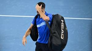 epa11803666 Novak Djokovic of Serbia getstures as he walks off the court after losing his quarter-finals match against Reilly Opelka of USA at the Brisbane International tennis tournament in Brisbane, Australia, 03 January 2025.  EPA/DARREN ENGLAND AUSTRALIA AND NEW ZEALAND OUT