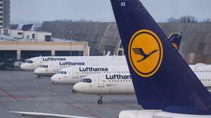 epa11203503 Airplanes of German airline Lufthansa are parked at the international airport in Frankfurt am Main, Germany, 07 March 2024. Despite five rounds of collective bargaining with the Federal Association of Aviation Security Companies (BDLS), Lufthansa employees went on strike over the lack of an agreement on wage increases for the approximately 25,000 aviation workers nationwide.  EPA/CHRISTOPHER NEUNDORF