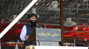 epa11548930 Taliban Interior Minister Sirajuddin Haqqani speaks during a military parade to celebrate the third anniversary of the Taliban government takeover, in Bagram, Afghanistan, 14 August 2024. The Taliban seized control of Kabul on 15 August 2021, following the collapse of the US-backed government amidst the chaotic withdrawal of foreign troops. Despite their consolidation of power and claims of improved security, the Taliban government remains unrecognized internationally, facing criticism for severe restrictions on women and a worsening humanitarian crisis affecting 23.7 million Afghans in need of assistance.  EPA/SAMIULLAH POPAL