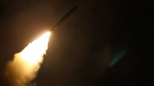 epa06668824 Image dated 14 April 2018 provided by the US Navy showing the guided-missile cruiser USS Monterey (CG 61) fires a Tomahawk land attack missile. Monterey is deployed to the U.S. 5th Fleet area of operations in support of maritime security operations to reassure allies and partners and preserve the freedom of navigation and the free flow of commerce in the region.  EPA/Matthew Daniels  HANDOUT EDITORIAL USE ONLY/NO SALES