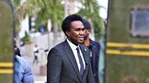 epaselect epa12252887 Riot police blocks media looking at Venancio Mondlane at the office of the attorney general (PGR) in Maputo, Mozambique, 22 July 2025. Venancio Mondlane was charged by the Mozambican public prosecutor’s office with five crimes in connection with the post-election demonstrations, including incitement to collective disobedience and instigation of terrorism.  EPA/LUÍSA NHANTUMBO